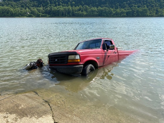 ISP: Man arrested on drug charges after officials pull partially submerged truck from river [Video]