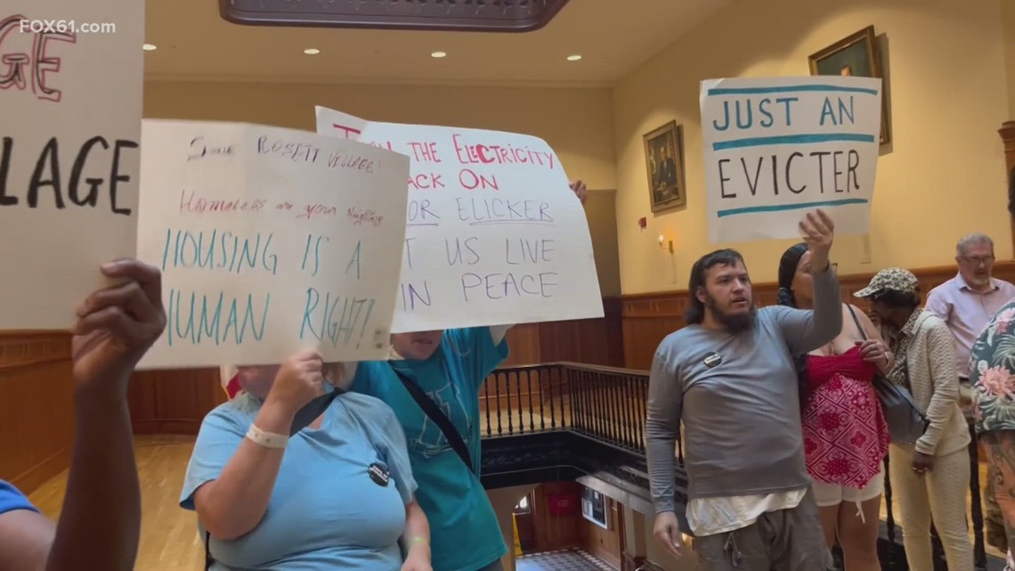 Protesters interrupt New Havens land bank announcement [Video]