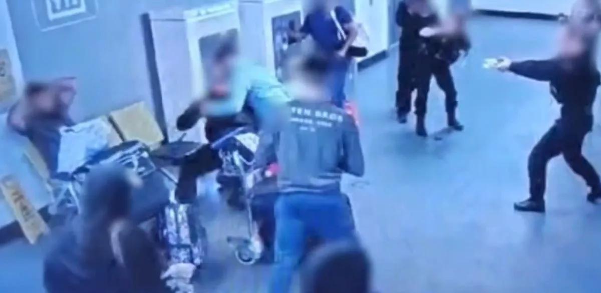 New Manchester Airport video reveals chaotic scene prior to man being kicked in the head by police officer  Share Talk