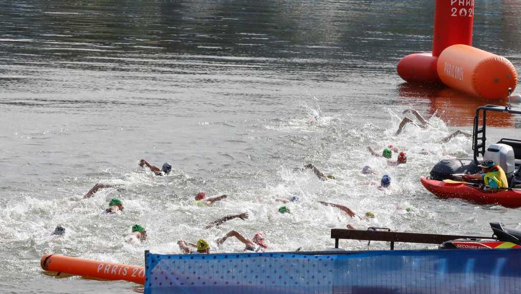 Belgium withdraws from mixed relay triathlon after athlete who swam in Seine River falls ill [Video]