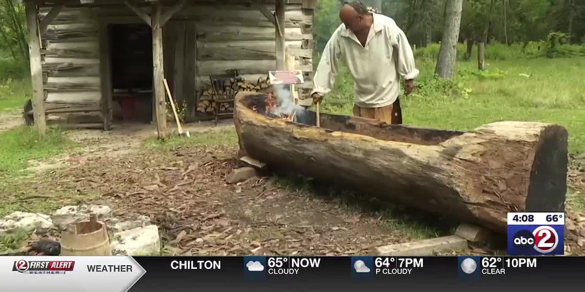 Oneida Tribe member building a burned-out canoe at Heritage Hill [Video]