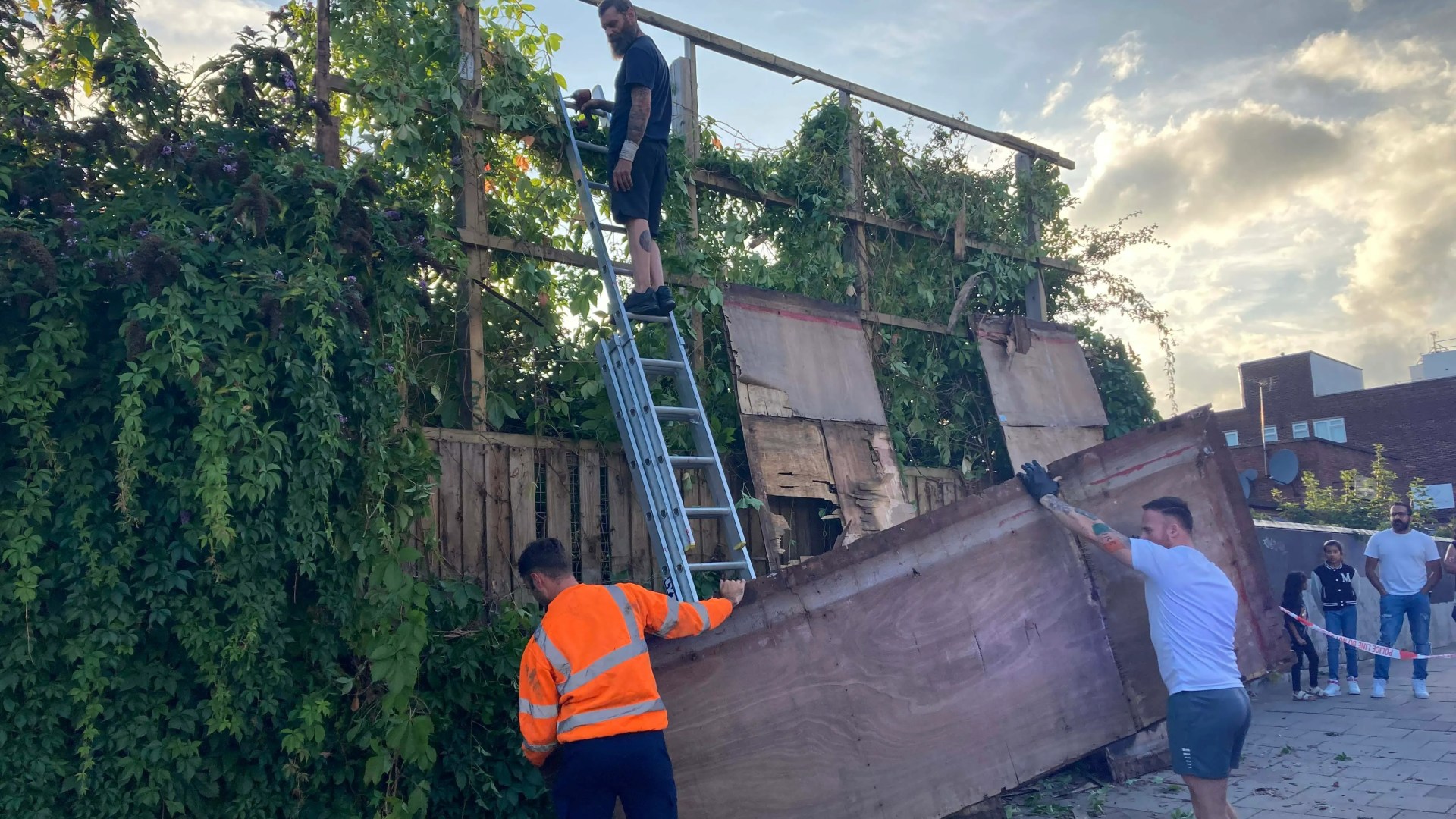 Fury as Banksy is ripped down just HOURS after its unveiling with cops taping off billboard & locals slamming ‘madness’ [Video]