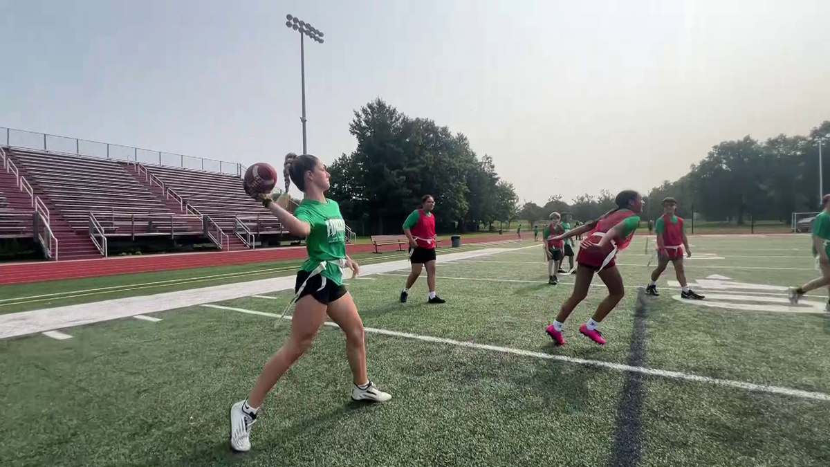 Lowell flag football camp brings together students, police officers [Video]