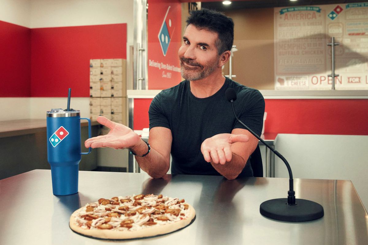 Simon Cowell Takes on New Judge Role to Review Domino’s Pizza [Video]