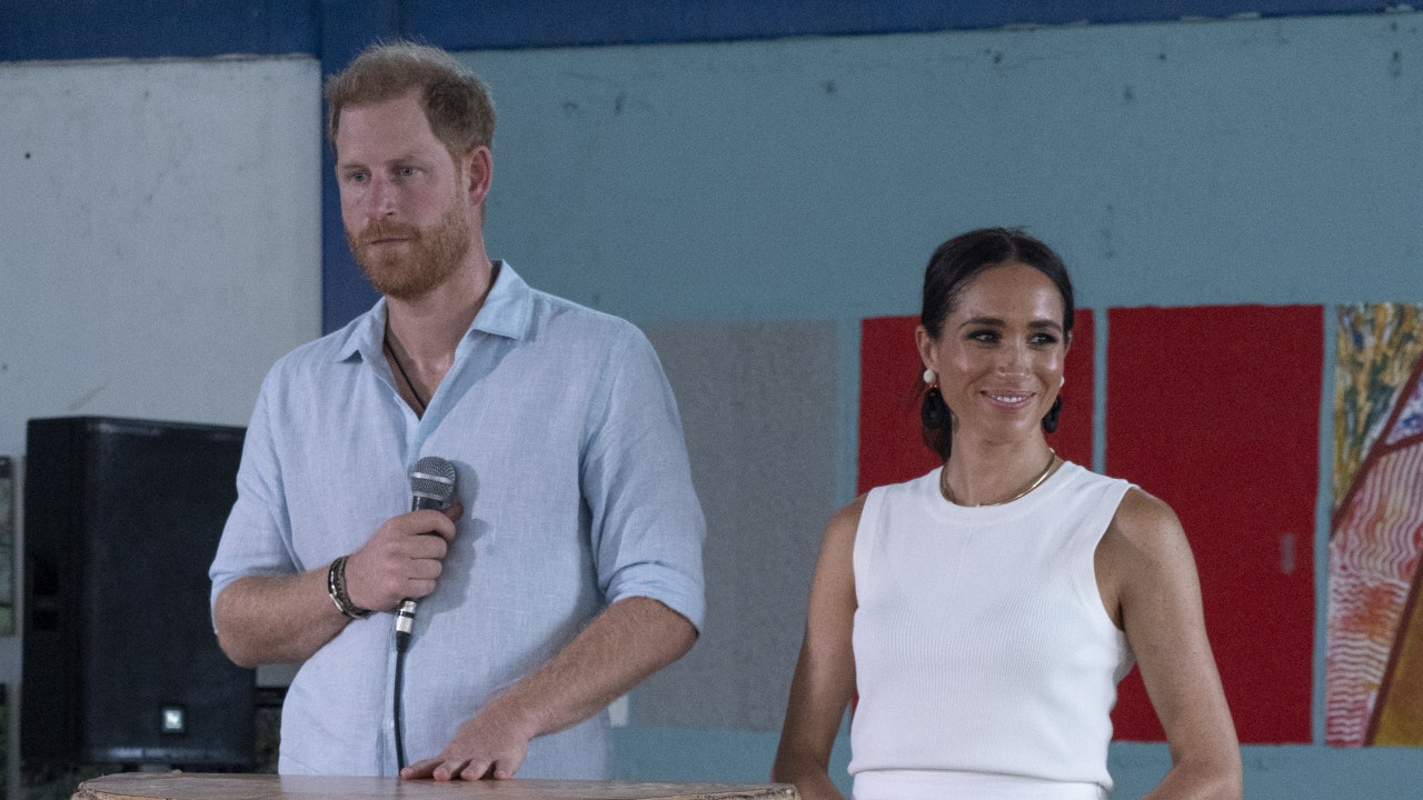 Prince Harry and Meghan Markle Look as in Love as Ever Kissing on the Dance Floor in Colombia [Video]