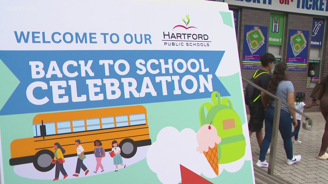 Families provided with school supplies at Dunkin’ Park event [Video]