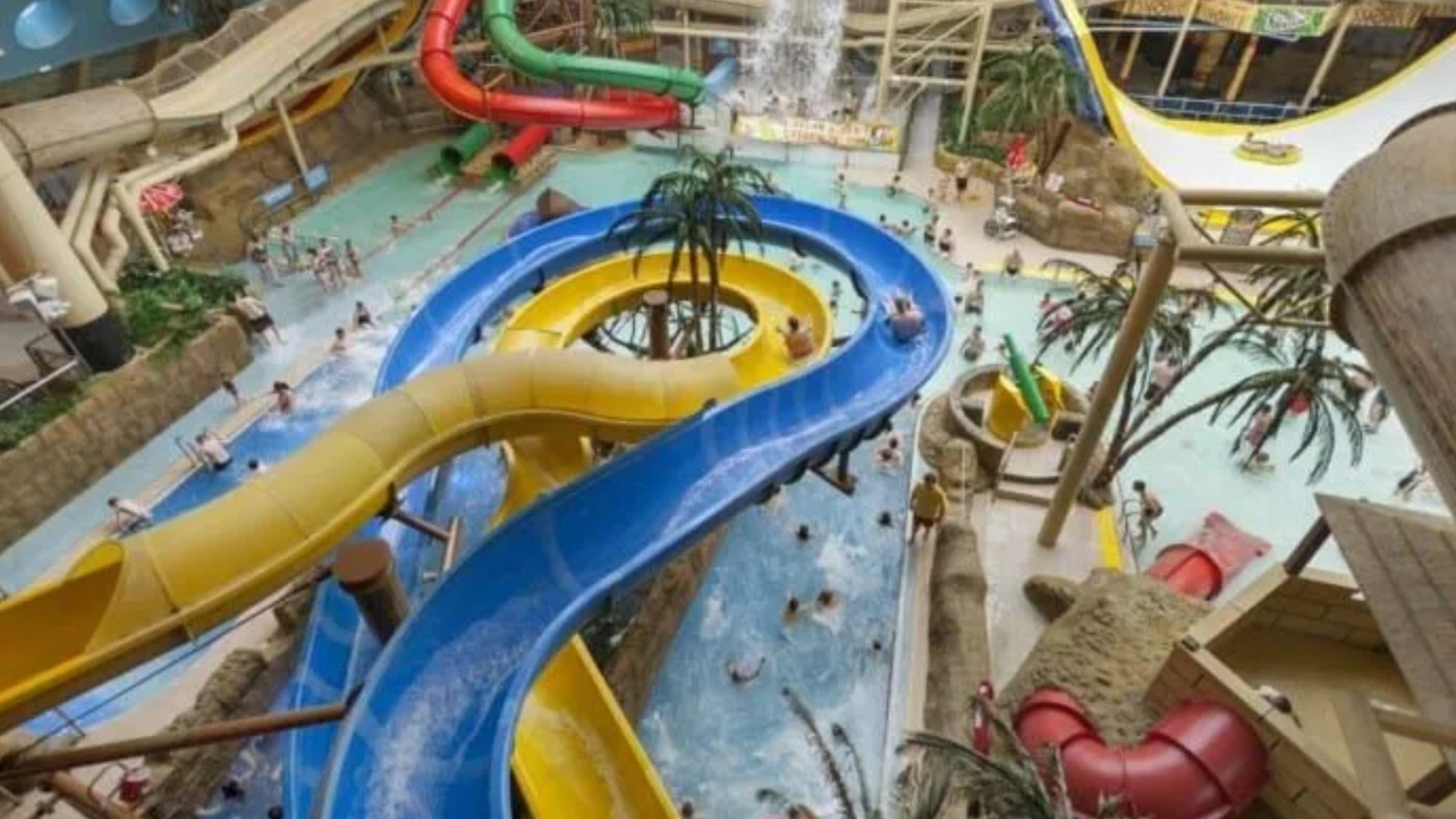 UK’s largest indoor waterpark that has tropical weather all year round – with 18 slides and record-breaking rides [Video]