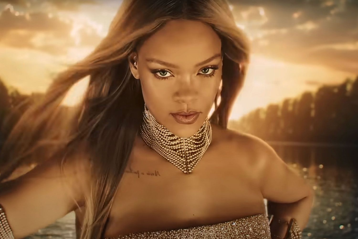 Rihanna Drips in Gold Replacing Charlize Theron as New Face of J’Adore [Video]