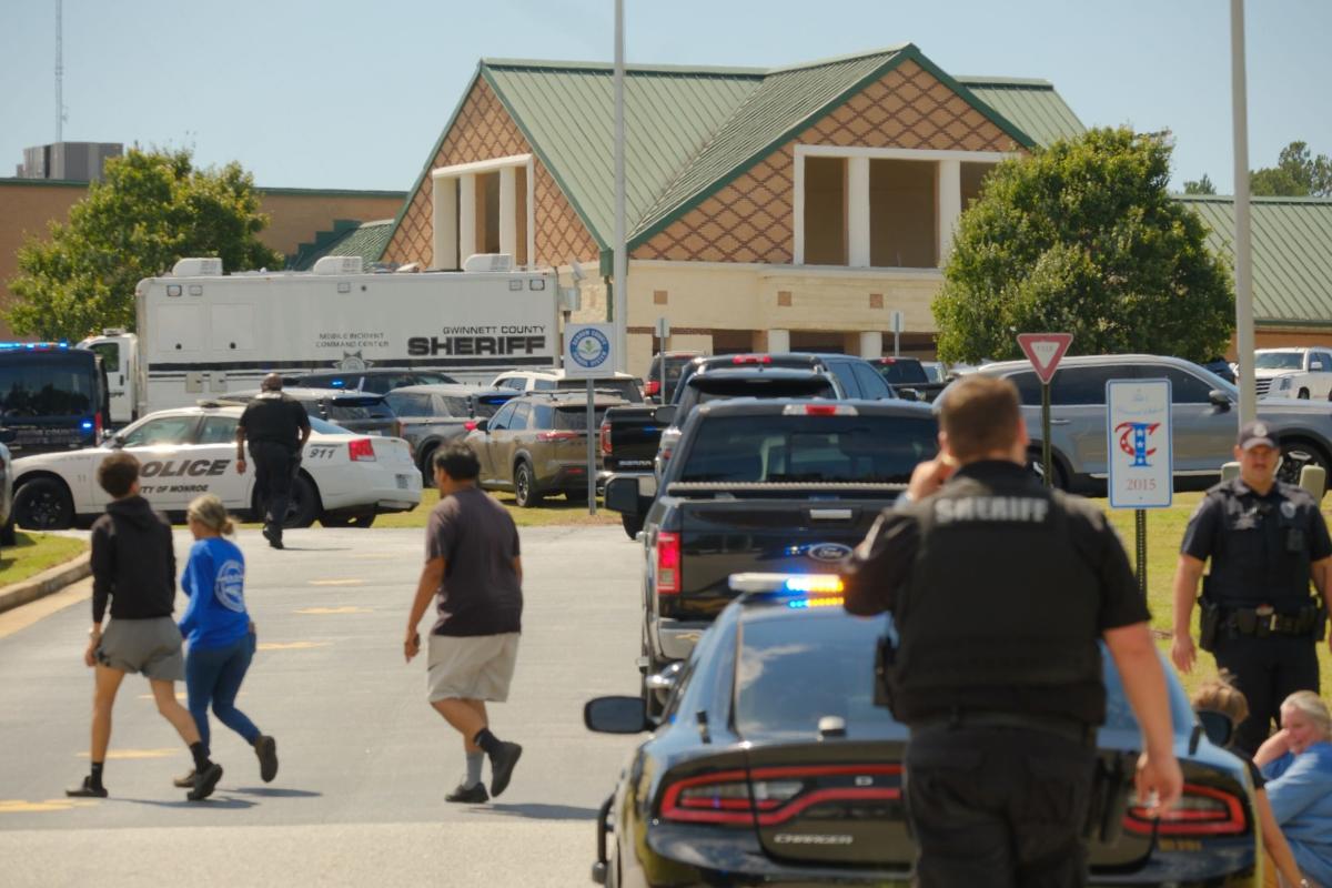 Community offers support, prayers at vigil for victims [Video]