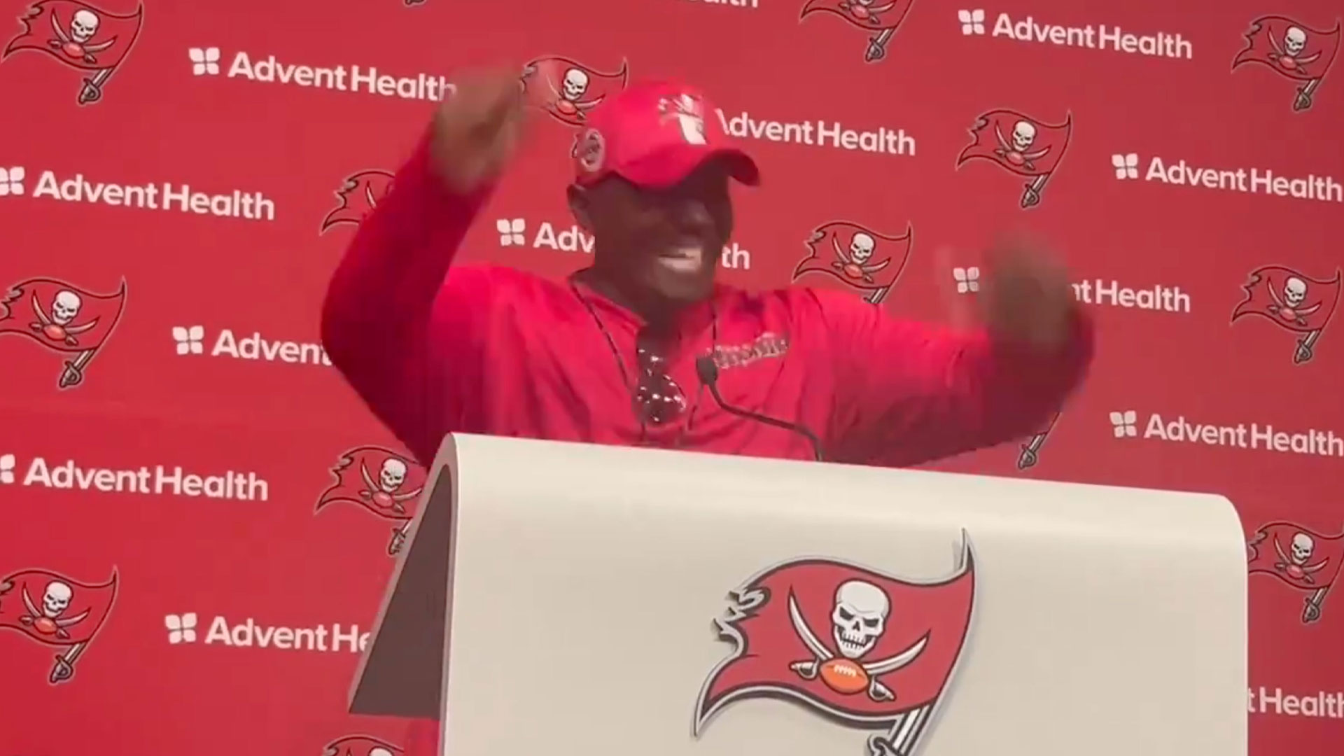 Fired-up Buccaneers coach Todd Bowles pounds fists on podium during press conference as reporters warn ‘you’re on video’