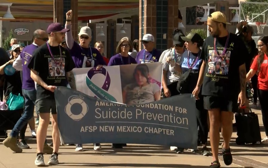 Locals remember those lost to suicide, raise funds for prevention with annual walk [Video]