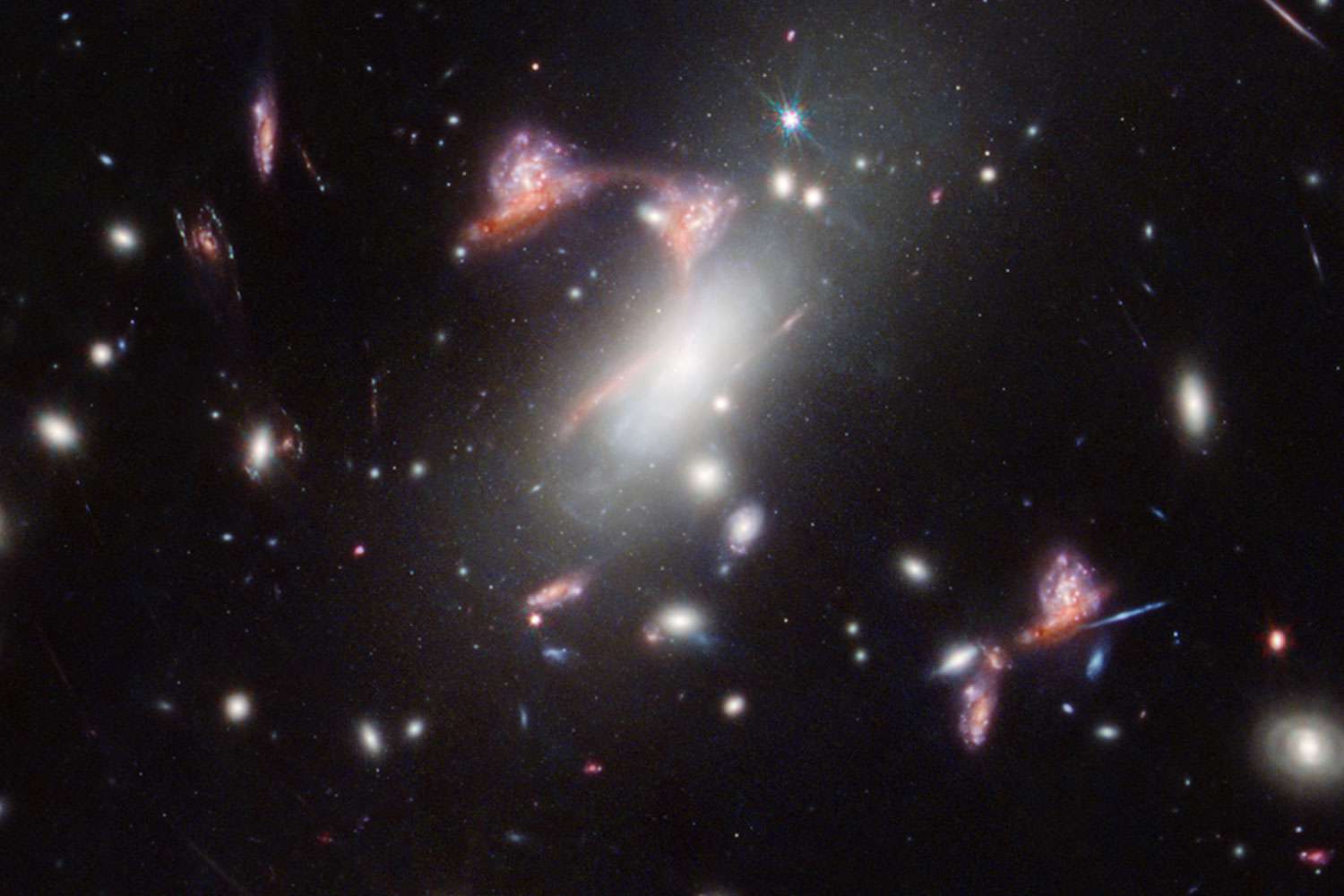 NASA Telescope Finds Distorted Galaxy That Looks Like a Question Mark [Video]