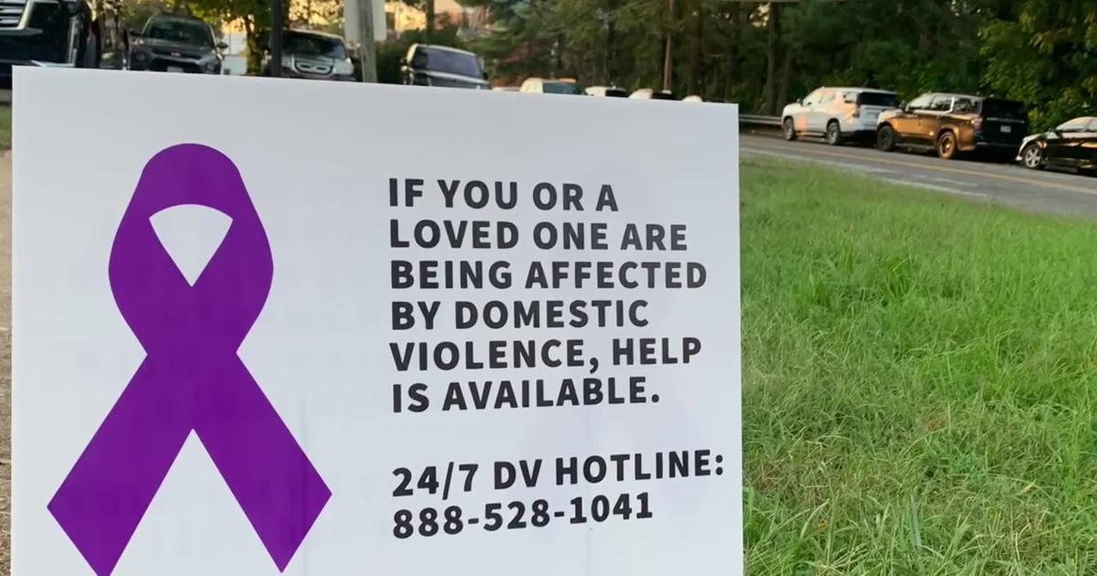 Amherst vigil honors domestic violence victims [Video]