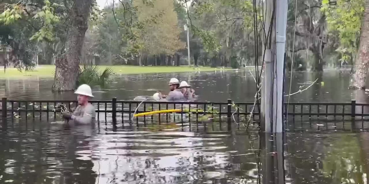 Crews work in floodwaters to restore power to customers [Video]