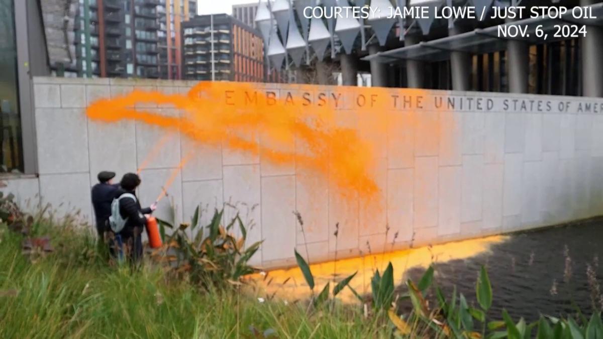 Climate activists spray US embassy in London with orange paint after Trump reelection victory [Video]