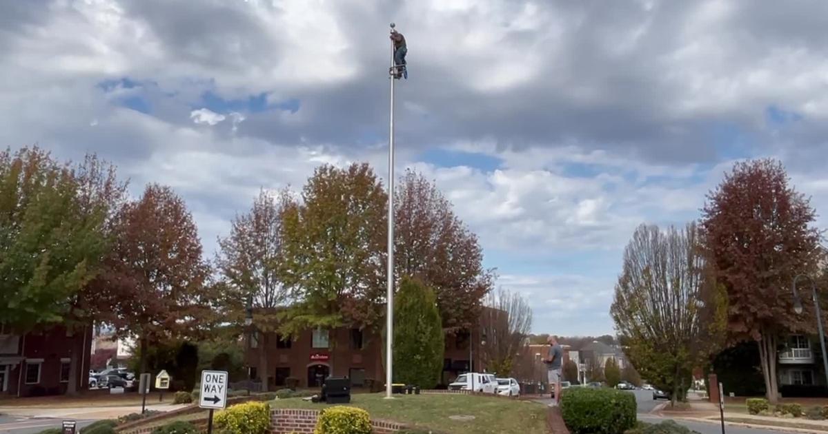 Todd Ross climbs flagpole in Lynchburg [Video]