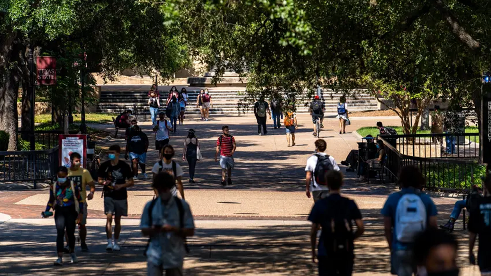 Texas State University president condemns 2 men who brought offensive signs to campus 1 day after the 2024 elections [Video]