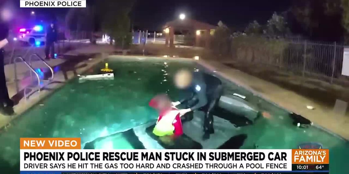 Phoenix police save man stuck in submerged car [Video]