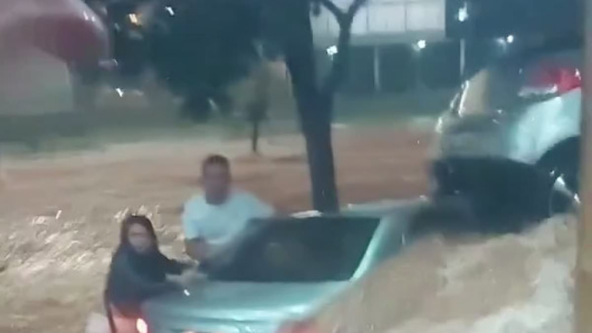 Harrowing video shows influencer and husband clinging on to their car in raging floods before she was swept away to her death – minutes after haunting final social media post