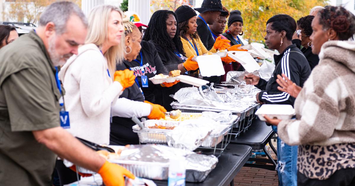 Watch community members get free Thanksgiving meals at The Longest Table in Opelika [Video]