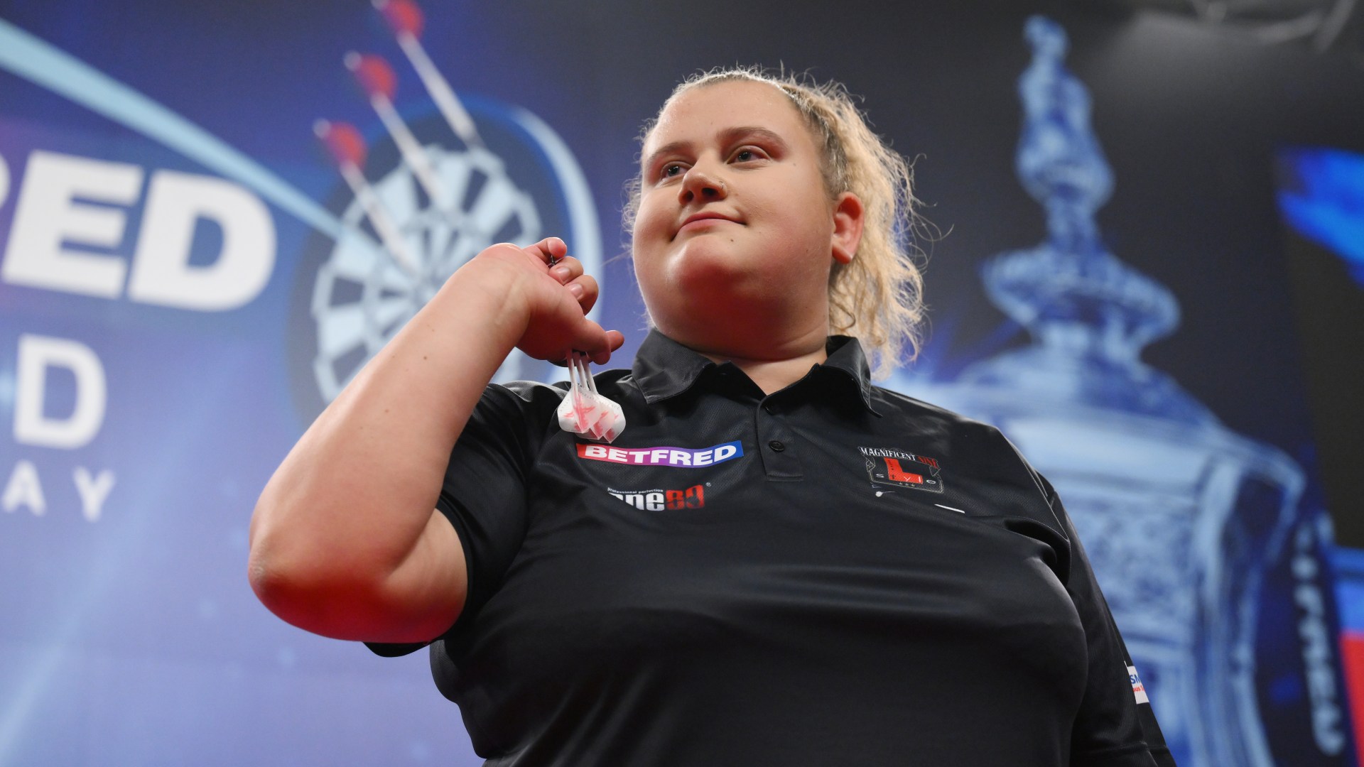 Beau Greaves hits out at ‘stupid rule’ that prevents her participation in PDC World Darts Championship [Video]