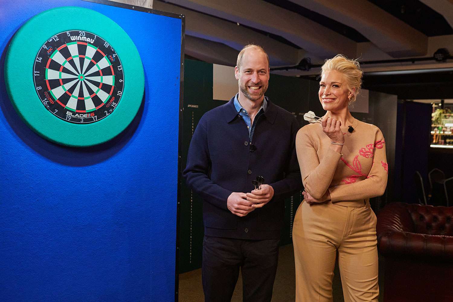 Why Are Prince William and Hannah Waddingham Playing Darts and Swigging Beers? [Video]