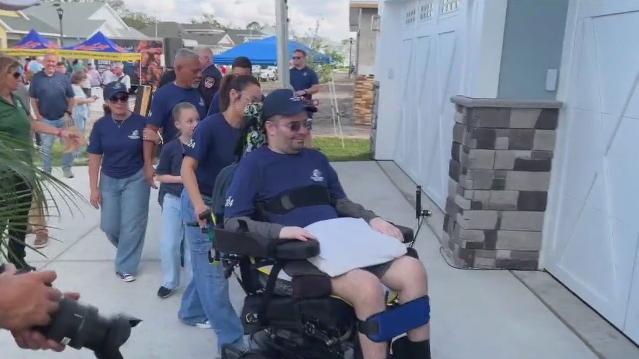 Paralyzed police officer gets new home [Video]