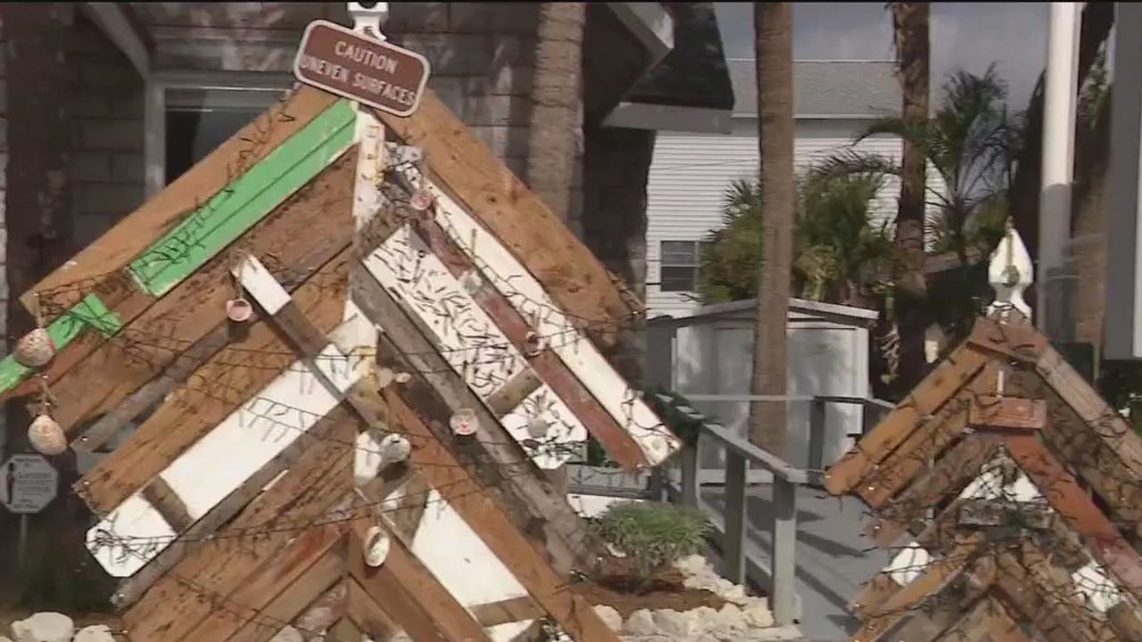 Artist uses storm debris to make Christmas trees [Video]