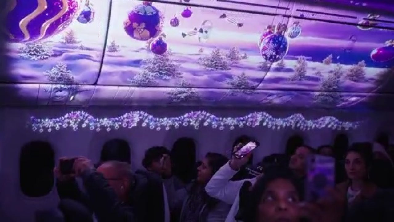 Air New Zealand SFO flight surprises passengers with Christmas party aboard plane [Video]