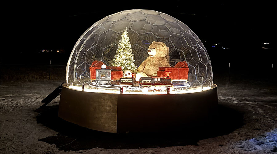 Local dad builds permanent life-sized snow globe to surprise his family [Video]