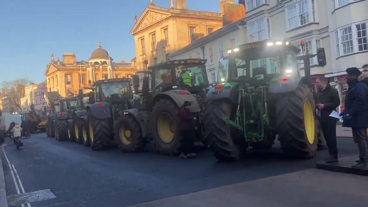 Angry farmers disrupt ministers speech with loud tractor tax protest | News [Video]