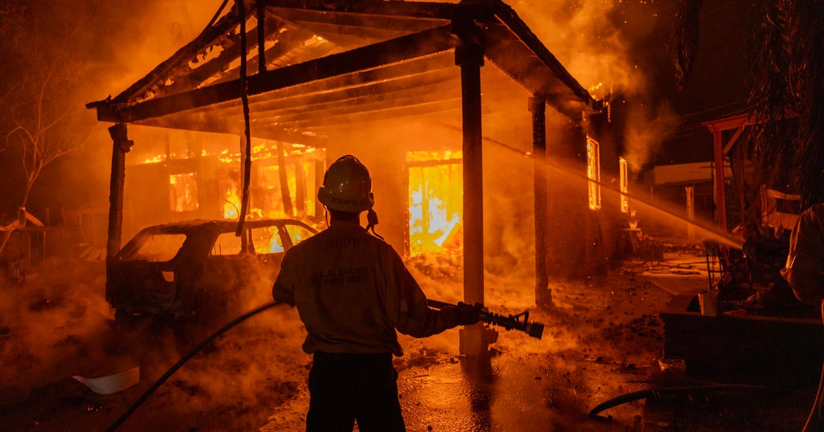 Los Angeles residents hire private firefighters to save their homes. Here