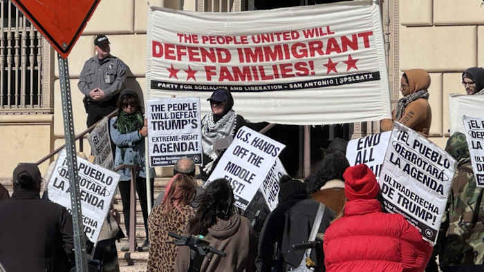 Activists rally downtown to protest against President-elect Donald Trump [Video]