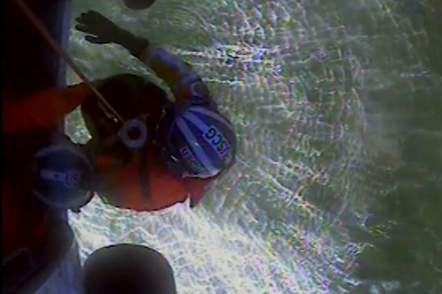 Father and Son, 15, Rescued After Getting Trapped on Rock While Boogie Boarding [Video]